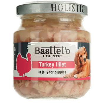 Вологий корм для цуценят Bastteto Holistic шматочки філе індички в желе 130 г А35015 фото